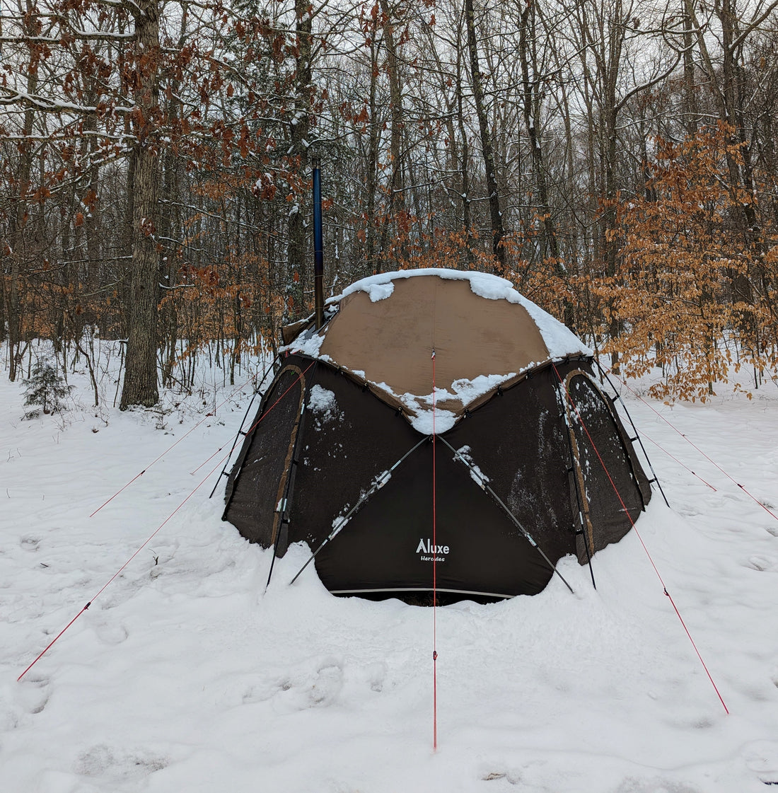Hercules Hot Tent with stove in snow